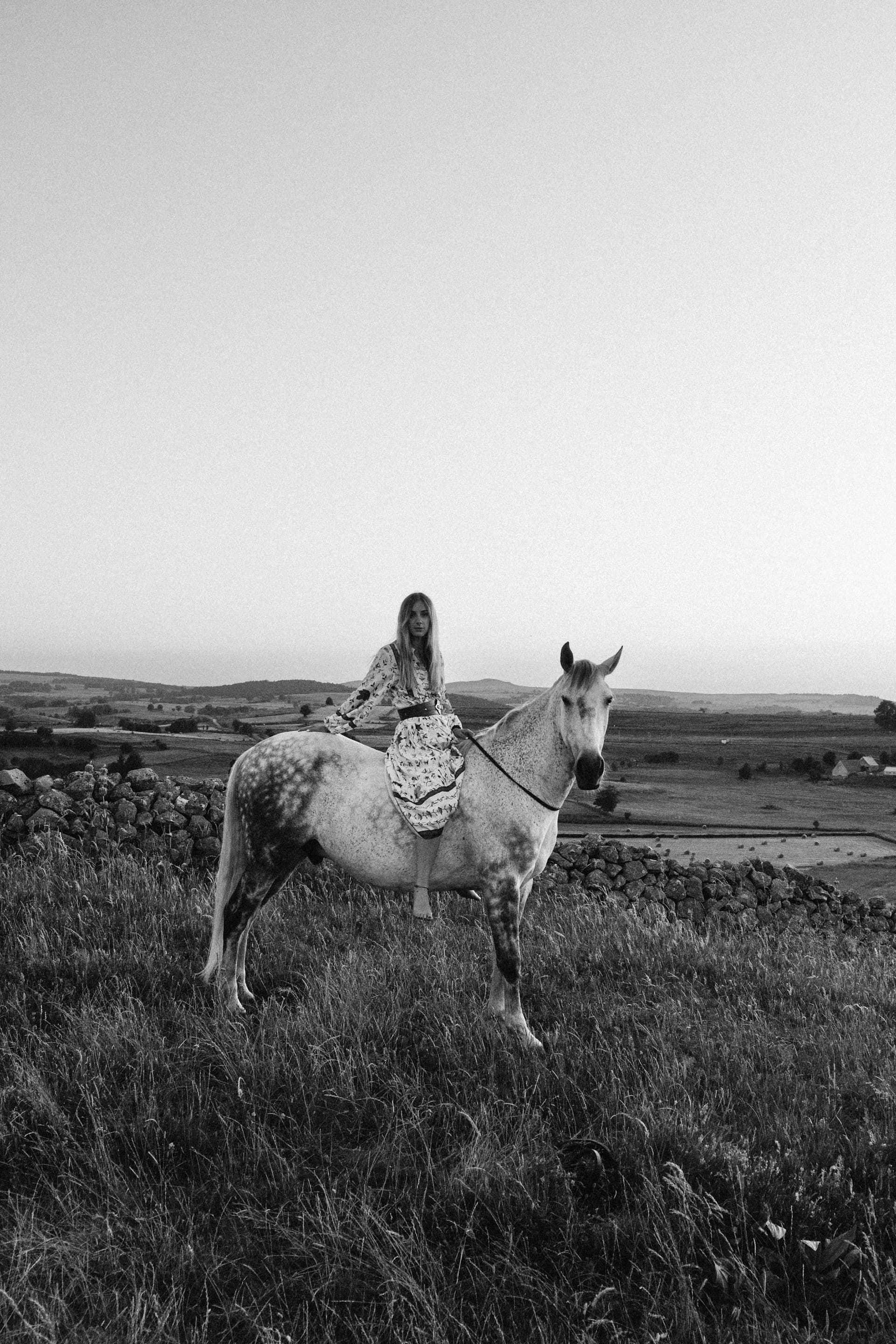 Woman on horse in countryside